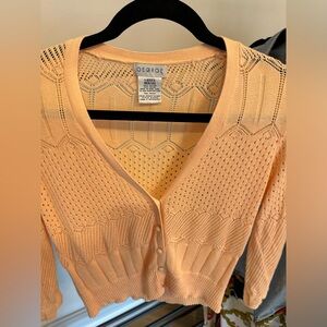 Oh so lovely peach colored cardigan. The buttons, oh the buttons!!! So so pretty